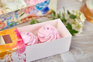 Gift box with homemade pink color marshmallows.