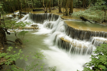 Beautiful waterfall with stones in forest, Thailand