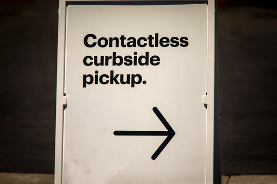 Sign Advertising Contactless Curbside Pickup At Retail Store Parking Lot