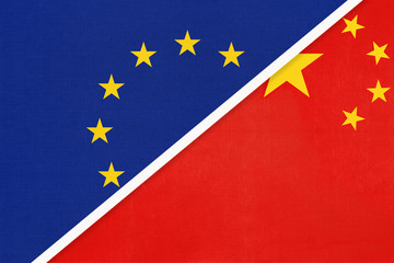 European Union or EU and China national flag from textile. Symbol of the Council of Europe association.