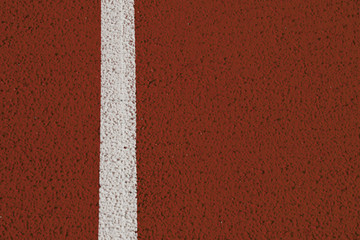 Close up of the white line on running track in the stadium. ...