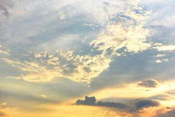 Naklejka na ściany i meble Beautiful sunset sky above clouds with dramatic light - sky with cloud before sunset
