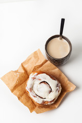 Home baked cinnamon roll/ cinnabon and coffee