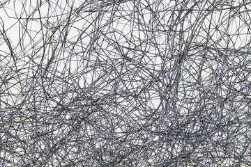 Abstract background from twisted thin branches or blades of grass