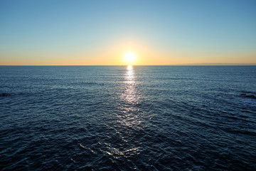 rising sun on the horizon, blue sea. Yeongdeok, Korea