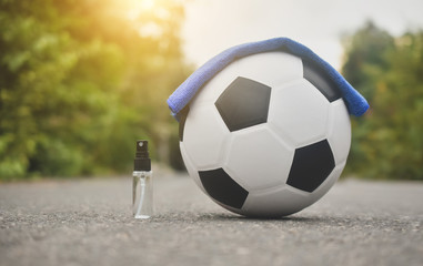 Soccer Football and alcohol spray for cleaning corona virus covid 19,New normal