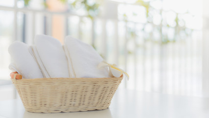 White towel with basket in bathroom