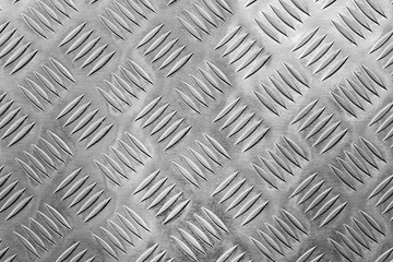 Metallic gray surface with a graphic pattern. Copy space.