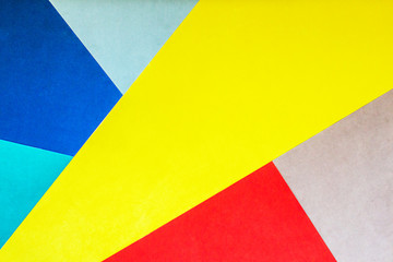 Multicolored colorful decorative wall panel made of fabric with abstract geometric pattern. Copy space.