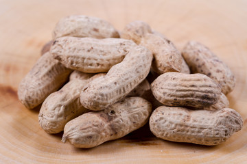 Peanuts closeup on the table. Healthly food. Nuts.
