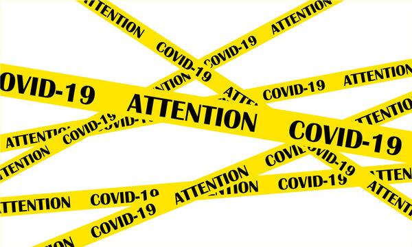 Yellow tape for quarantine zone with the words attention covid-19