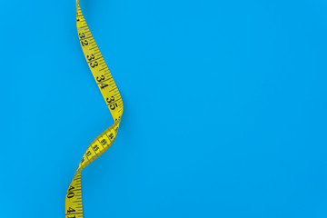 tape measure on blue background