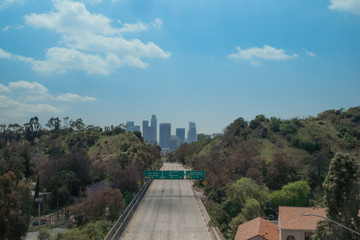 View of the Los Angeles Skyline and empty 110 Freeway from the Park Row Drive Bridge, Los Angeles, California