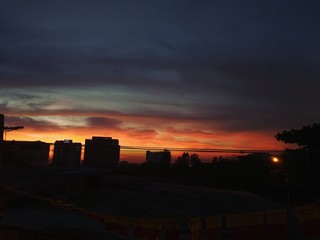 Silhouette Of Buildings At Sunset
