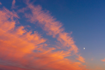 Summer sunset colors on crimson clouds during the white nights