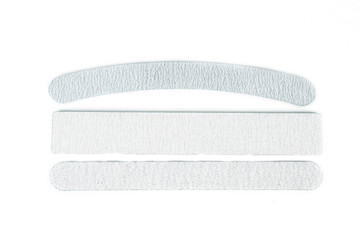 Nail files isolated on white background. The concept of manicure, body care. Creative background,...