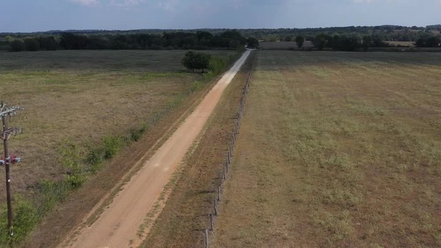 Flying Low over a Country Gravel Road, Burleson County, Texas, USA