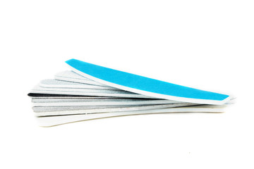 Nail files isolated on white background. The concept of manicure, body care. Creative background, copy space.