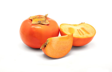 Natural fresh persimmons isolated on white background.