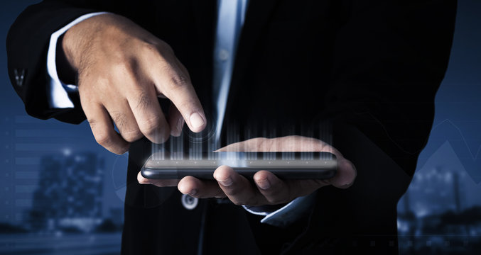 Hand Business Man touch screen Smartphone 5G service searching for virtual industry Manager solution with modern network Interface, Innovation Graphs to market stock analyst. - Powered by Adobe