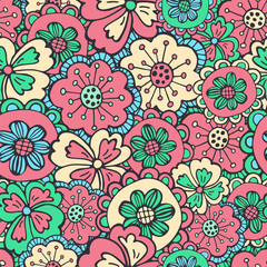 Fototapeta premium Hand drawn seamless pattern of blooming flowers, leaves with patterns. Spring floral set elements. Colorful doodle sketch illustration for design card, invitation, wallpaper, wrapping paper, fabric