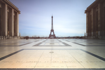 Beautiful cityscape urban street view of the Eiffel tower in Paris, France, on a spring day, seen...