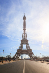 Beautiful cityscape urban street view of the Eiffel tower in Paris, France, on a spring day