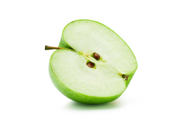 Green apple cut in half on white background. Commercial image isolated with clipping path.