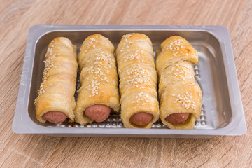 Freshly bakery sausage in dough