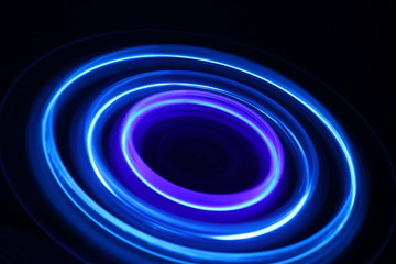 Circular blue pattern formed by spinning LED bulbs