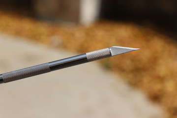 Naklejka premium Pen knife also called as hobby knife with interchangeable blades