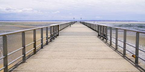 Andernos les Bains empty pontoon pier on sand beach