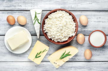 
Different types of dairy products on a stone background 