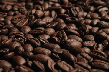 roasted coffee beans, can be used as background. Coffee production concept for coffee shop. Grains after roasting
