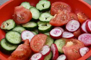 salad with tomatoes, reddish and cucumbers