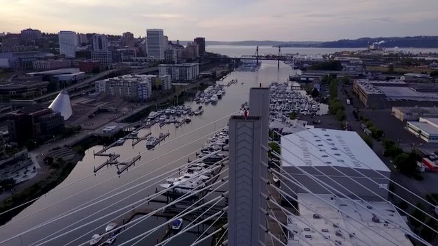 The 509-Bridge, A Cable-Stayed Bridge Over Thea Foss Waterway In Tacoma, Washington - ascending drone shot