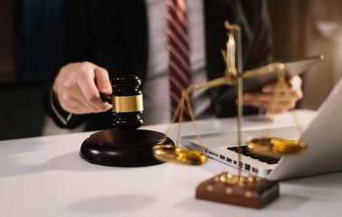 Lawyer business man working with paperwork on his desk in office workplace for consultant lawyer in office.