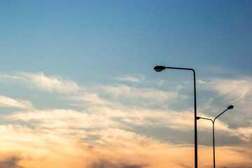 Evening sky and street lamps