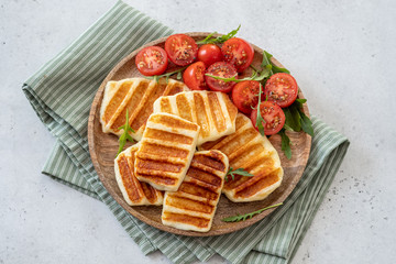 Grilled Halloumi Cheese and fresh tomato salad.