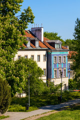 Panoramic view of historic, richly decorated colorful tenement houses at Bugaj, Mostowa and Brzozowa streets of Starowka Old Town quarter in Warsaw, Poland