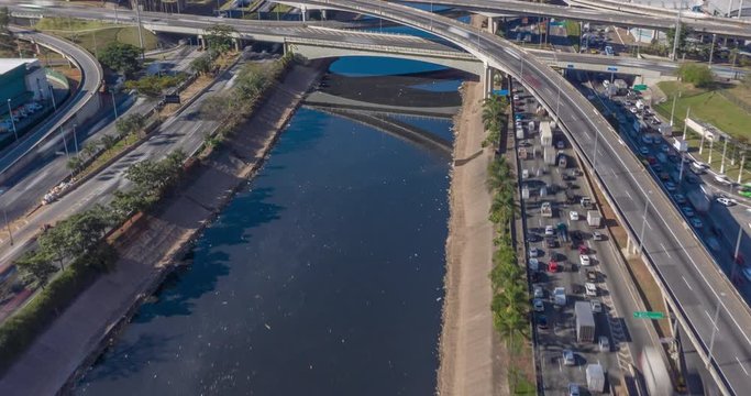Aerial hyperlapse with heavy traffic shot during the day with long exposure. Bridge in marginal Tiete avenue in Sao Paulo, Brazil