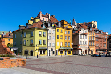 Panoramic view of historic colorful tenement houses at Royal Castle Square - Plac Zamkowy - in Starowka Old Town quarter of Warsaw, Poland