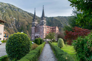 Fototapeta na wymiar Santa Maria Real of Covadonga's basilica view from its green gardens.