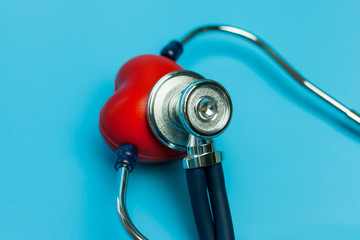 stethoscope and red heart Heart Con blue backgorund