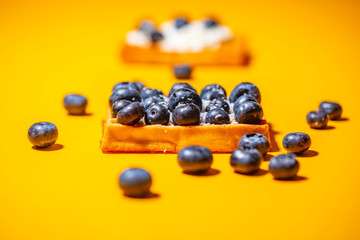 Sweet Homemade waffles with fresh blueberries