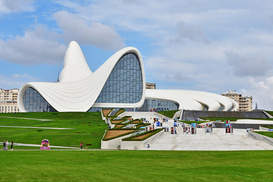Baku, Azerbaijan, September, 12, 2019. People walking near Heydar Aliyev Center in Baku in cloudy autumn day, Azerbaijan