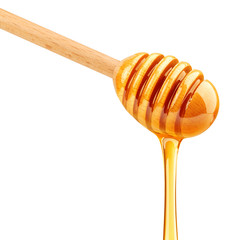 Honey dripping isolated on white background, clipping path, full depth of field