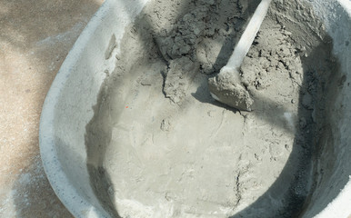 Using a hoe for concrete mixer, Bucket for mixing cement for construction work in Thailand