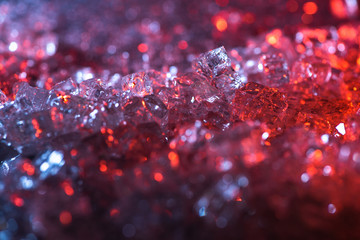 close up view of abstract red and purple crystal textured background