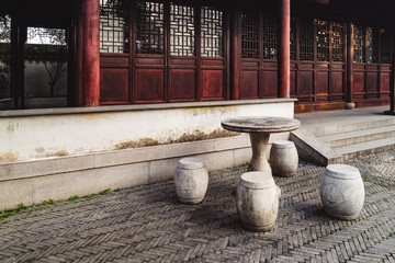 Marble tables and chairs at Humble Administrator's Garden, Suzhou, Jiangsu province, China.